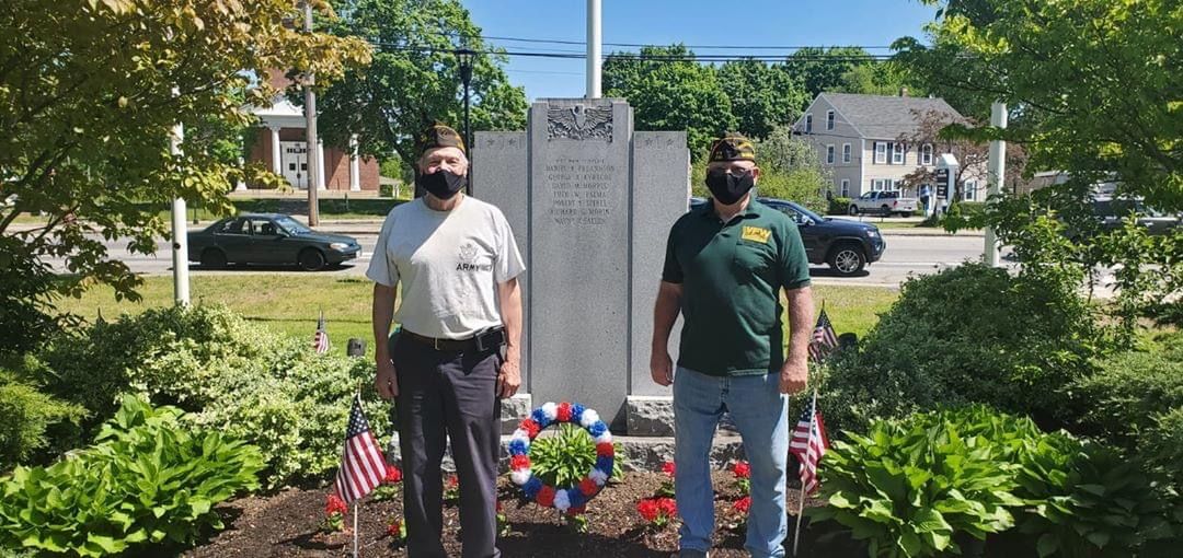 Post Surgeon Fred Myra and Post Commander Vinnie Oliva stand in front of the Tewksbury Vietnam Memorial